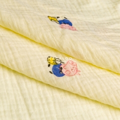 Pink pig screen printed cotton double gauze muslin fabric