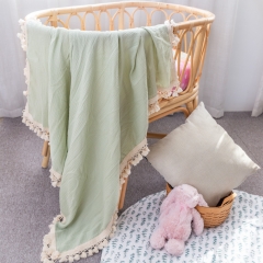 100% cotton muslin swaddle with tassels for bibies